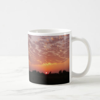 Tasse de beauté de coucher du soleil