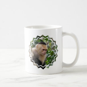 Tasse de café blanche de singe de capucin de