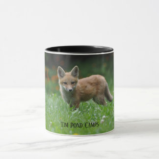 Tasse de café de camps de région sauvage d'étang