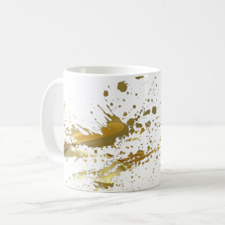 Tasse de café d'éclaboussure de peinture d'or