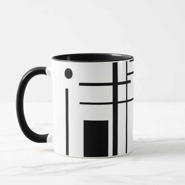 Tasse de café géométrique noire et blanche de (Gauche)