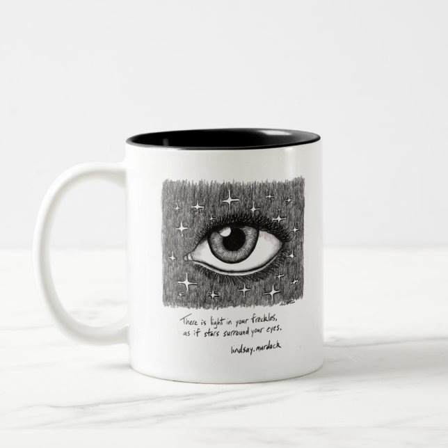 tasse de café noire et blanche avec la citation et (Gauche)