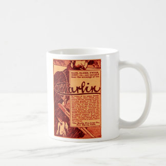 Tasse de café orange d'annonce d'arme à feu
