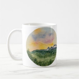Tasse de coucher du soleil de montagne
