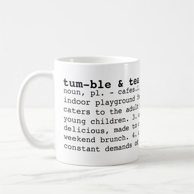 tasse de dictionnaire de dégringolade et de café (Gauche)