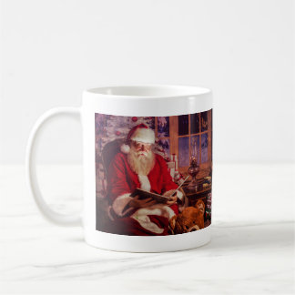 Tasse de Père Noël avec le livre magique