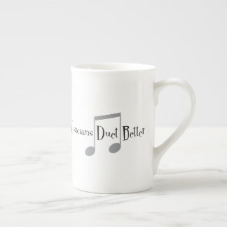 Tasse de porcelaine tendre de duo (notes)
