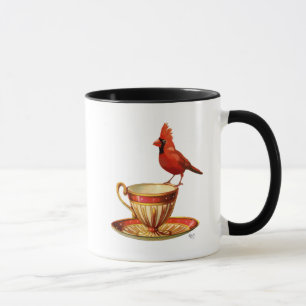 Tasse de thé et cardinal rouge