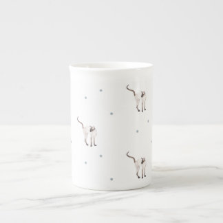 Tasse de thé siamoise de porcelaine tendre