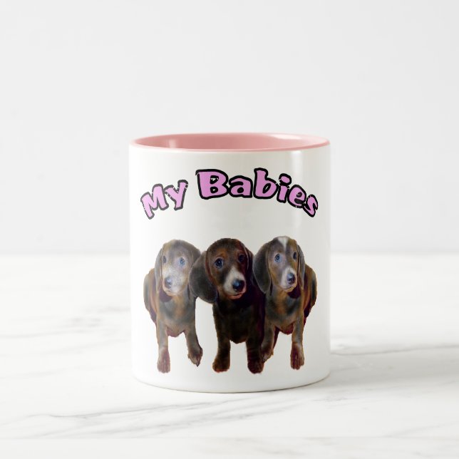 Tasse de trois chiens de teckel (Centre)