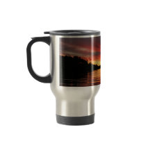Tasse d'or de voyage de coucher du soleil
