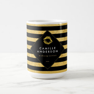 Tasse d'or et de café de maquilleur de rayures de