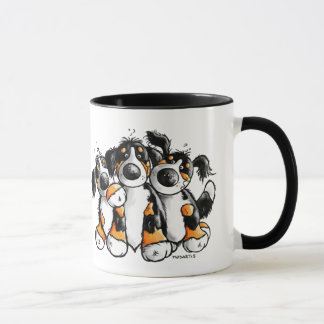 Tasse drôle de trois de Bernese chiens de montagne