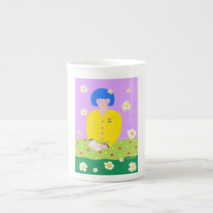 Tasse En Porcelaine Femme lisant dans le jardin