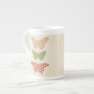 Tasse En Porcelaine Motifs de papillon décoratifs sur l'arrière - plan
