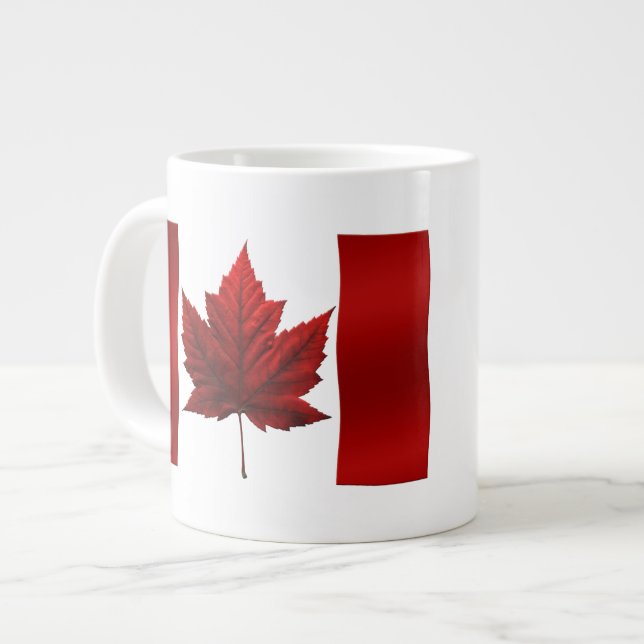 Tasse enorme de souvenir du Canada de tasse de (Devant gauche)