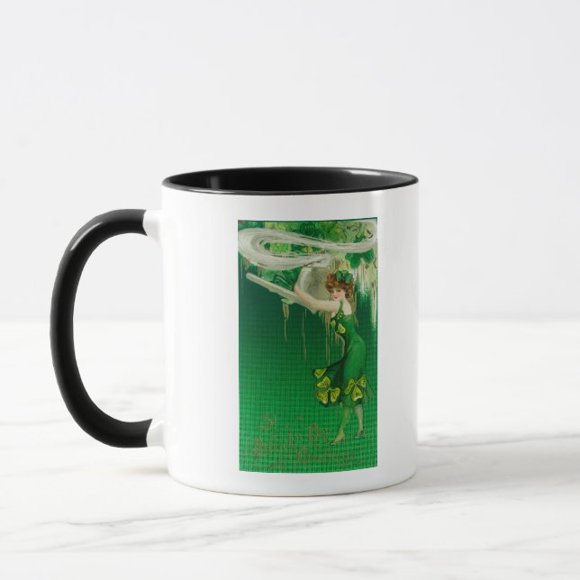 Tasse Femme en vert tenant une scène de tuyau (Gauche)