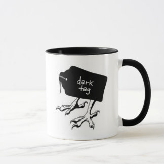 Tasse foncée d'étiquette