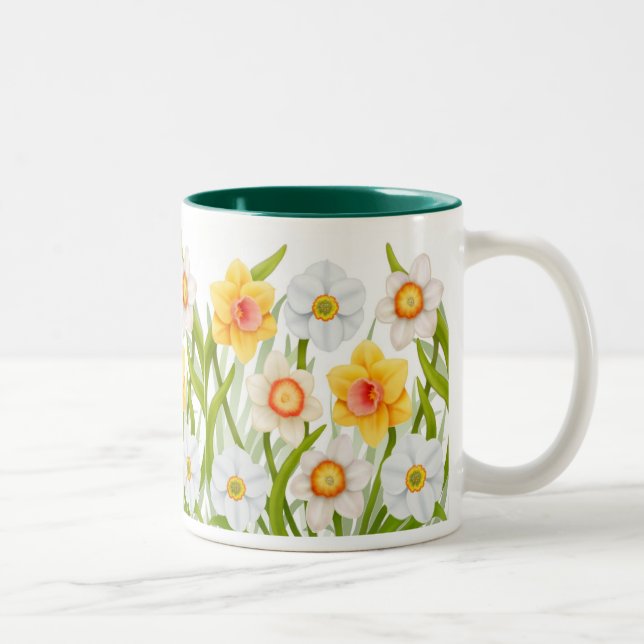 Tasse gaie de jonquilles de ressort (Droit)