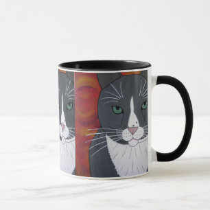 Tasse grise de visage de chat