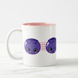 Tasse heureuse de myrtille