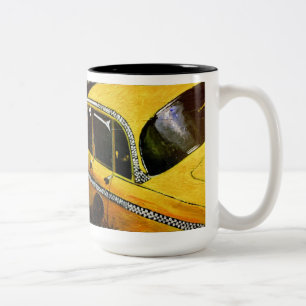 Tasse jaune de taxi