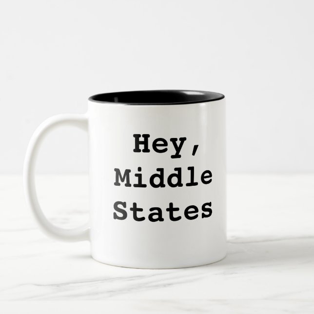 Tasse moyenne anglaise d'états d'évaluation de KU (Gauche)