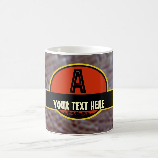 Tasse préhistorique de monogramme de "A" (Centre)