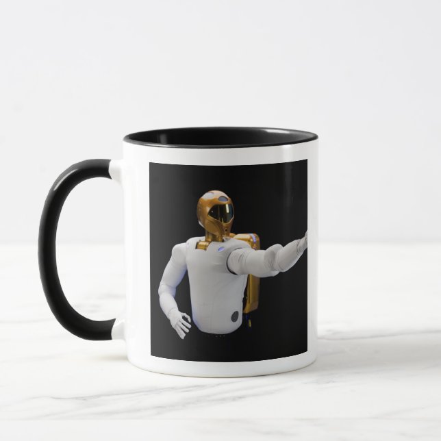 Tasse Robonaut 2, un astronaute habile et dextérité, aid (Gauche)