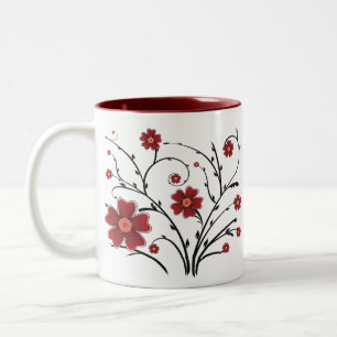Tasse rouge de fleurs