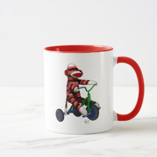 Tasse Singe de chaussette sur le tricycle