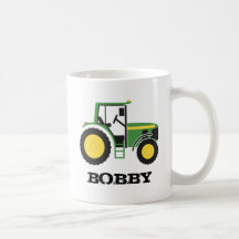 Tasse verte de tracteur avec le nom