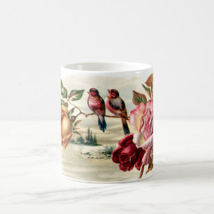 Tasse vintage de roses d'oiseau