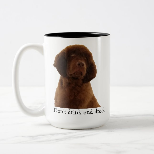 Tasses Brown et plus de chiot de Terre-Neuve (Gauche)