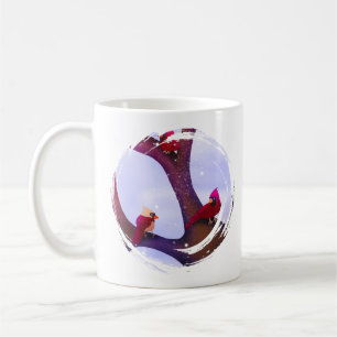 Tasses de vacances avec des cardinaux perchés sur