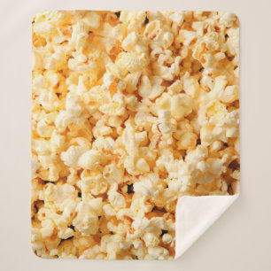 Tasty popcorn on whole background. Food Sherpa Blanket