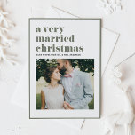 Taupe Green Married Christmas Modern Photo Wedding Holiday Card<br><div class="desc">Merry Christmas | Send your warm holiday wishes with this customizable photo Christmas card. It features " A Very Married Christmas" in bold typography. Personalize this modern holiday card by adding your details. This custom wedding Christmas card is available in other colours and cardstock. Matching items are available.</div>