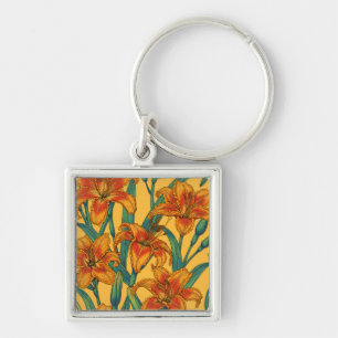 Tawny daylily flowers, blue and yellow keychain