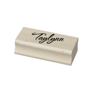 Taylynn name in decorative cursive font rubber stamp