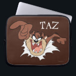 TAZ™ Bursting Through Page Laptop Sleeve<br><div class="desc">LOONEY TUNES™ | Check out this TAZ™ Bursting Through Page artwork! Click the customize button to begin personalizing your very own LOONEY TUNES™ merchandise!</div>