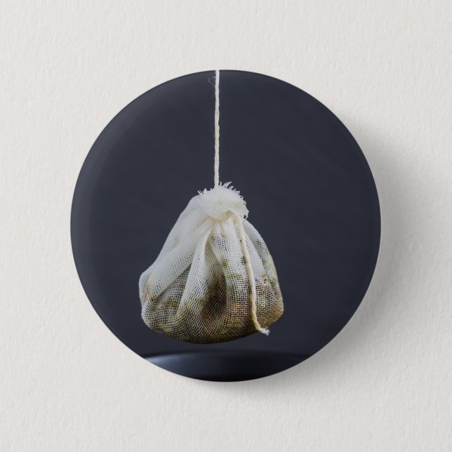 Tea bag is hung in a cup 2 inch round button (Front)