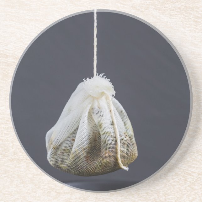 Tea bag is hung in a cup coaster (Front)