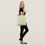 Tea Green Solid Blank Colour Tote Bag<br><div class="desc">Tea green solid blank colour is a light green with earth toon.
Colourful colour that makes it suitable for many designs and solid colours.
Cheerful colour with joyful inspiration & happiness.
Hex# E1EDBD</div>