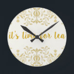 Tea Time Round Clock<br><div class="desc">This elegant yet simple clock will always tell you what time it really is! Makes a great gift for anyone who enjoys a good cup of tea, or who owns a tea shop. Ordering is safe, simple, fast, and fun. Like us: facebook.com/ShopJandL Be sure to browse all of our stores...</div>