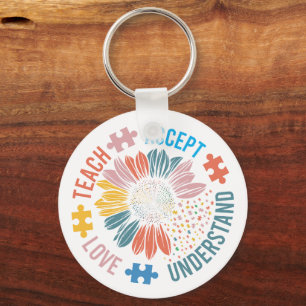 "Teach Accept Love Understand" Puzzle Piece Flower Keychain