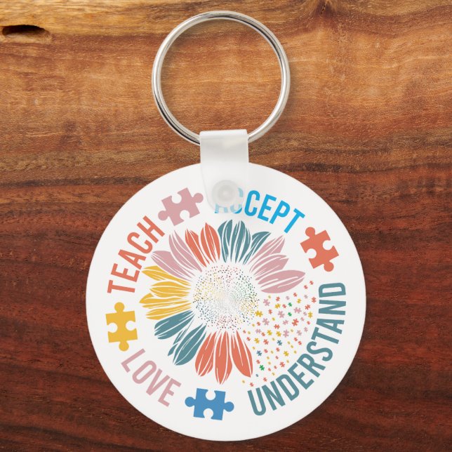 "Teach Accept Love Understand" Puzzle Piece Flower Keychain (Front)