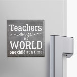 Teacher chalkboard white typography script quote magnet<br><div class="desc">"Teachers change the world one child at a time" thoughtful typography quote in blackboard background and white script. It could make a nice thank you gift to your best teacher.</div>