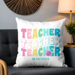 Teacher Modern Rainbow Colours Personalized Name Throw Pillow<br><div class="desc">Teacher Modern Rainbow Colours Personalized Name Throw Pillows features the text "Teacher" in modern rainbow colour repeat script typography with your custom personalized name below. Perfect for your favourite teacher for teacher appreciation,  birthday,  Christmas,  holidays and more. Designed by Evco Studio www.zazzle.com/store/evcostudio</div>