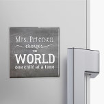 Teacher name chalkboard white typography quote magnet<br><div class="desc">Name and white typography script inspired from the quote "Teachers change the world one child at a time" on blackboard background. Personalize it with your best teacher's name and make it a nice thank you keepsake gift for her/him!</div>