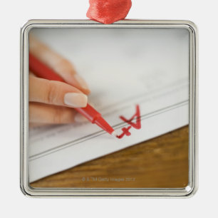 Teacher writing A plus grade on worksheet Metal Ornament